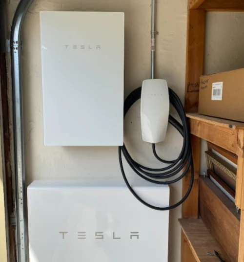 tesla charging station installed in a residential house